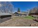 Beautiful house featuring big backyard with seating area, and lush artificial grass at 3604 Collins St, Castle Rock, CO 80108