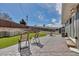 Backyard featuring artificial turf and a patio seating area, perfect for outdoor entertaining at 3604 Collins St, Castle Rock, CO 80108
