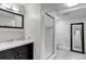 Bathroom featuring shower with glass door, toilet and a sink with vanity at 3604 Collins St, Castle Rock, CO 80108