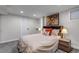 Cozy bedroom featuring a comfortable bed with an eye-catching headboard and artistic wall decor at 3604 Collins St, Castle Rock, CO 80108