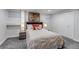 Comfortable bedroom with carpet floors, a queen bed, soft lighting, and ample storage for a relaxing ambiance at 3604 Collins St, Castle Rock, CO 80108