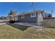 Side view of the home showcasing its landscaping and architectural details at 3604 Collins St, Castle Rock, CO 80108