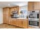Bright kitchen featuring stainless appliances, sleek countertops, and modern cabinetry at 3604 Collins St, Castle Rock, CO 80108