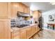 Modern kitchen featuring stainless steel appliances, granite countertops, and plenty of storage space at 3604 Collins St, Castle Rock, CO 80108