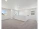 Bright bonus room with recessed lighting, neutral paint, and plush gray carpeting at 1311 Rock Cliff Ave, Erie, CO 80516