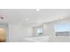 Second floor hallway featuring recessed lighting and a window with a view at 1311 Rock Cliff Ave, Erie, CO 80516