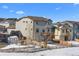 Large backyard with a two-story home, shed, and playground at 1018 Mcmurdo Cir, Castle Rock, CO 80108