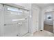 Bathroom with a large walk-in shower and grey vanity at 1018 Mcmurdo Cir, Castle Rock, CO 80108