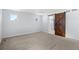 Spacious bedroom with barn door and neutral decor at 1018 Mcmurdo Cir, Castle Rock, CO 80108