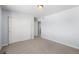 Empty bedroom with double doors and carpet at 1018 Mcmurdo Cir, Castle Rock, CO 80108