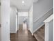 Bright entryway with hardwood floors and staircase at 1018 Mcmurdo Cir, Castle Rock, CO 80108