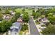 An aerial shot of the neighborhood, highlighting the home's proximity to green spaces, and tree-lined streets at 915 Mercury Cir, Littleton, CO 80124
