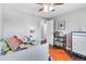Inviting bedroom with colorful decor and a comfy daybed, perfect for relaxation and play at 915 Mercury Cir, Littleton, CO 80124