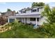Beautiful two-story home features a well-maintained lawn and solar panels, with a spacious two-car garage at 915 Mercury Cir, Littleton, CO 80124