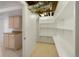 Convenient basement storage space with built-in shelves and easy access at 2840 S Yates St, Denver, CO 80236