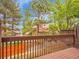 Enjoy the private deck surrounded by lush trees and a serene atmosphere at 2627 E Nichols Cir, Centennial, CO 80122