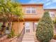 Inviting townhome exterior with well-maintained landscaping and a charming entrance at 2627 E Nichols Cir, Centennial, CO 80122