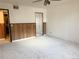 Large bedroom featuring clean carpet, mirrored closet doors and bi-color walls at 390 Zang St # 5-102, Lakewood, CO 80228