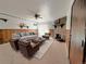 Cozy living room featuring a stone fireplace, plush seating, and a sliding glass door at 390 Zang St # 5-102, Lakewood, CO 80228