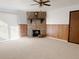 Bright living room with a beautiful fireplace, and ample space for entertaining and relaxation at 390 Zang St # 5-102, Lakewood, CO 80228