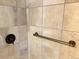Close up of a modern shower with a grab bar and sleek fixtures at 390 Zang St # 5-102, Lakewood, CO 80228