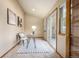 Cozy home office with natural light, desk space, and access to the outdoors at 8696 W Iliff Ave, Lakewood, CO 80227