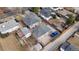 Birds eye view of the backyard featuring a detached garage and alley access at 2381 Newark St, Aurora, CO 80010