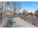 Cozy deck with views of backyard and two chairs at 1752 Peninsula Cir, Castle Rock, CO 80104