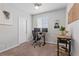 Functional office space with desk, chair, dual monitors, and natural light from a window at 1752 Peninsula Cir, Castle Rock, CO 80104
