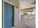 Covered entryway with a blue door at 2672 S Cathay Way # 304, Aurora, CO 80013