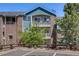 Attractive two-story building featuring brick and blue siding and lovely balconies at 2672 S Cathay Way # 304, Aurora, CO 80013