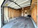 Spacious garage features ample storage space and a concrete floor at 2672 S Cathay Way # 304, Aurora, CO 80013