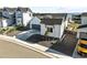 Aerial view of a well-manicured house with a gray garage door and minimal front yard landscaping at 4855 Saddle Iron Rd, Castle Rock, CO 80104