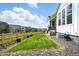 Well-maintained backyard with lush green grass, a wooden fence, and lovely landscaping, ideal for outdoor enjoyment at 4855 Saddle Iron Rd, Castle Rock, CO 80104