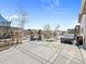 Expansive backyard featuring a modern patio, hot tub, fire pit, and a trampoline for outdoor enjoyment at 2924 Echo Park Dr, Castle Rock, CO 80104