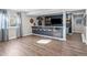 Finished basement with bar area, complete with seating, bar shelves, and a TV at 2924 Echo Park Dr, Castle Rock, CO 80104