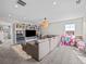 Spacious bonus room with comfortable seating, large TV, and playroom area at 2924 Echo Park Dr, Castle Rock, CO 80104