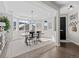 Bright dining area with natural light, neutral tones, modern furnishings, and decor at 2924 Echo Park Dr, Castle Rock, CO 80104