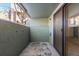 Cozy covered patio with sliding glass door access, perfect for outdoor relaxation and entertaining at 14100 E Temple Dr # W04, Aurora, CO 80015