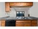 Kitchen featuring breakfast bar with view out to patio with view into the dining room at 14100 E Temple Dr # W04, Aurora, CO 80015