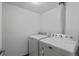 Stackable washer and dryer in dedicated laundry room at 14100 E Temple Dr # W04, Aurora, CO 80015