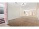 Spacious basement featuring neutral carpet, natural light, and recessed lighting at 1904 S Union Pl, Lakewood, CO 80228