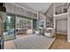 Bright living room featuring a neutral color palette, deck access and views of the outdoors at 3640 Summertime Ct, Monument, CO 80132