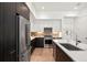 Modern kitchen with stainless steel appliances, white countertops and stylish cabinetry at 1735 E 18Th Ave, Denver, CO 80218