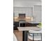 Partial view of an open kitchen showcasing stainless steel appliances, under-cabinet lighting and quartz countertops at 1735 E 18Th Ave, Denver, CO 80218