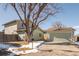 Ranch style home with attached garage and mature tree in front yard at 6308 W 92Nd Pl, Westminster, CO 80031