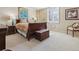 Well-lit bedroom with a full bed, a window with blinds, and decor that creates a relaxing atmosphere at 1111 Race St # 3A, Denver, CO 80206