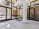 Spacious lobby area with tall ceilings, ample natural light, and a welcoming entrance for residents and guests at 1111 Race St # 3A, Denver, CO 80206