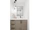 Bright bathroom featuring modern vanity with pendant lights and a framed mirror above at 4481 Raleigh St, Denver, CO 80211