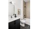 Contemporary bathroom with walk-in shower and black vanity at 4481 Raleigh St, Denver, CO 80211